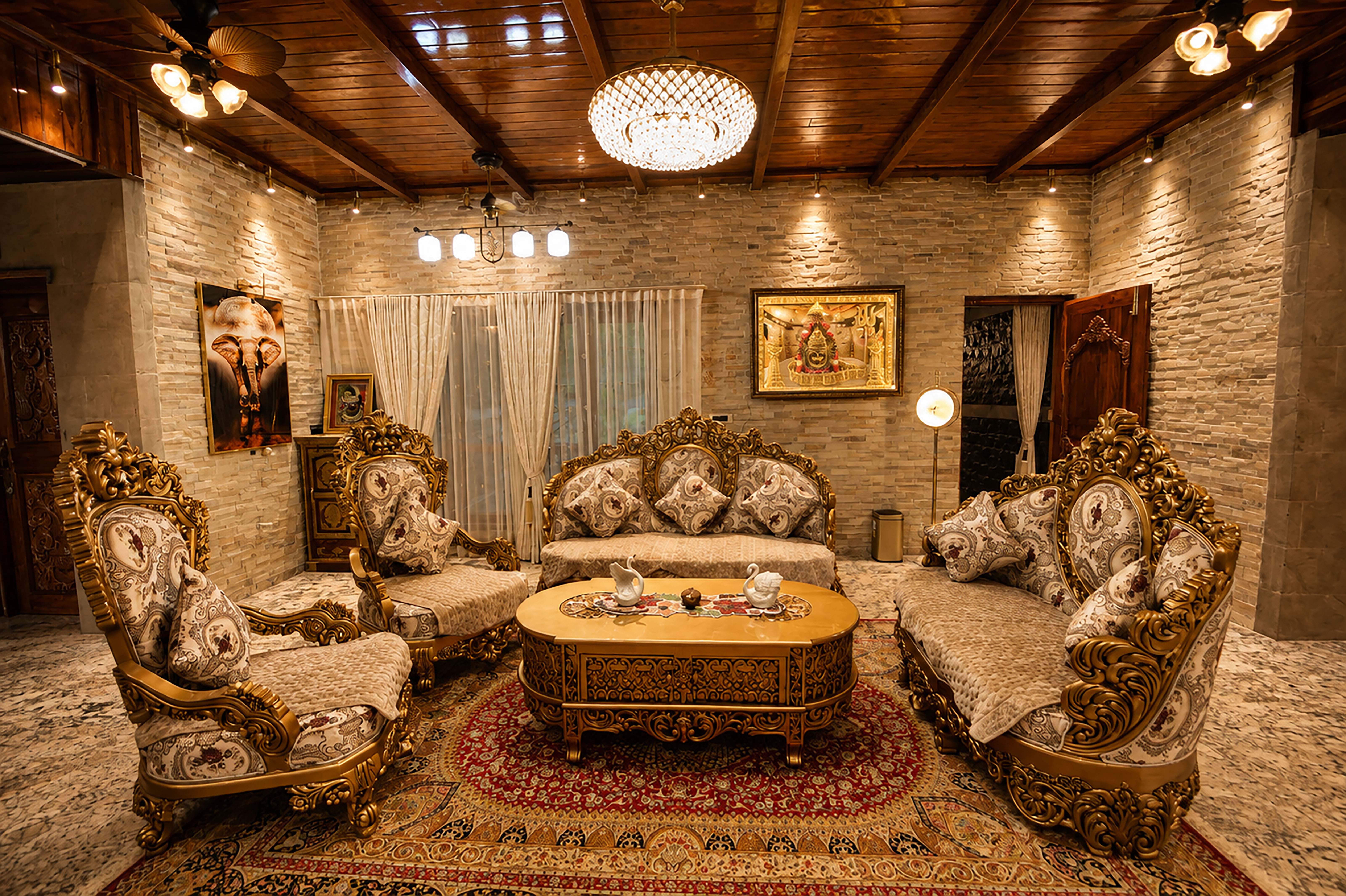 Living room with gold upholstered seating