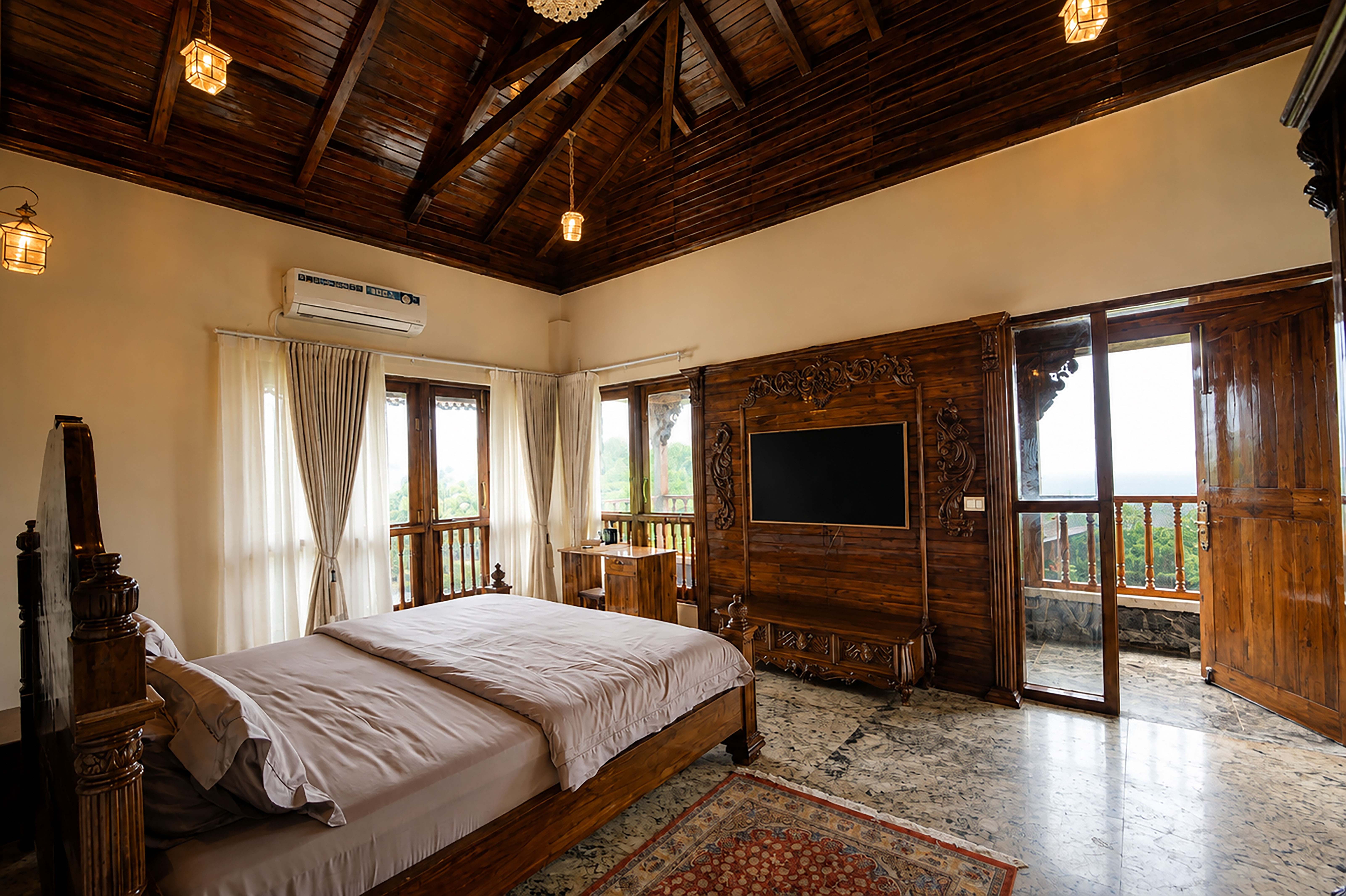 Bedroom with brick accent wall and balcony